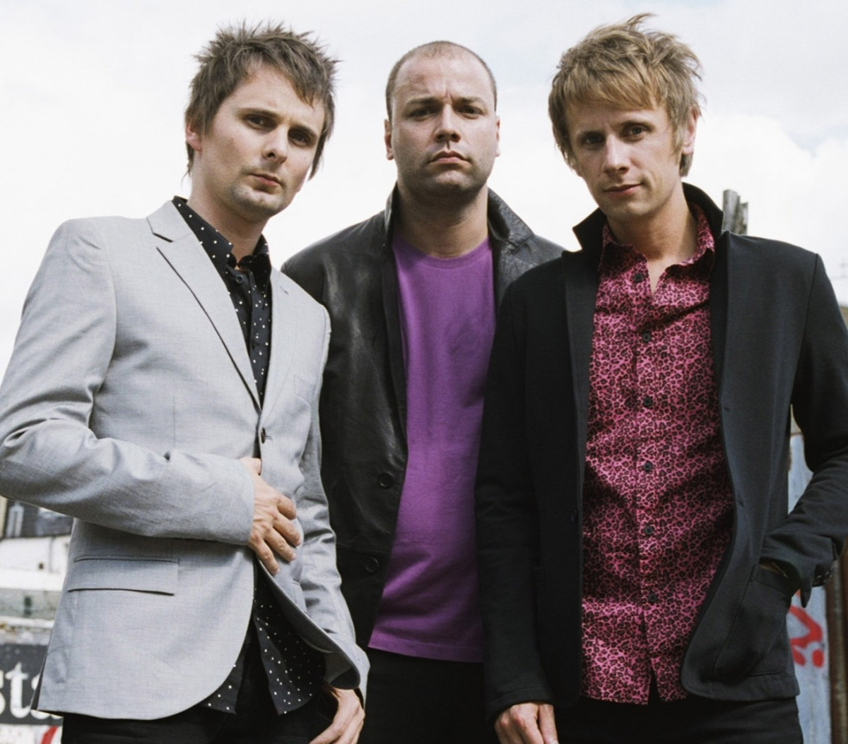 Группа знать слушать. The Muse. Muse Британская рок-группа. Британская рок-группа Muse афиша. Muse Hullabaloo.
